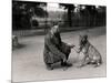 Keeper Leslie Martin Flewin with Peter, a Tame Wolf-Frederick William Bond-Mounted Photographic Print