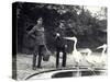 Keepers Alf Taylor (Right) and Bodman (Left) Feeding Fish to Pelicans at Poolside in London Zoo-Frederick William Bond-Stretched Canvas