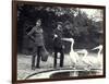 Keepers Alf Taylor (Right) and Bodman (Left) Feeding Fish to Pelicans at Poolside in London Zoo-Frederick William Bond-Framed Photographic Print