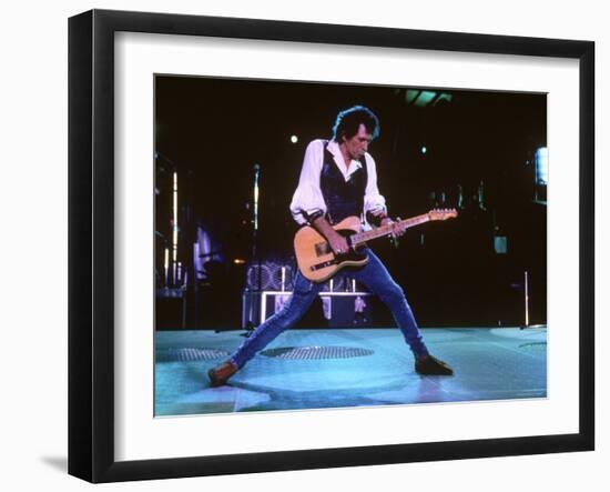 Keith Richards During a Performance by the Rolling Stones-null-Framed Premium Photographic Print