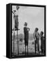 Kenneth Merriman on higher stilts than his brothers and friend-Robert W^ Kelley-Framed Stretched Canvas