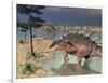 Kentrosaurus Dinosaurs Walking in the Water Next to Sand and Trees-null-Framed Art Print