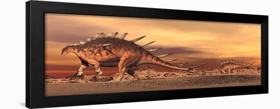Kentrosaurus Mother and Baby Walking in the Desert by Sunset-null-Framed Art Print