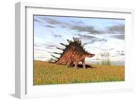 Kentrosaurus Walking across a Grassy Field-null-Framed Art Print