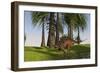 Kentrosaurus Walking Along a Nearby Swamp-null-Framed Art Print