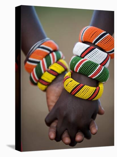 Kenya, Laikipia, Ol Malo; a Samburu Boy and Girl Hold Hands at a Dance in their Local Manyatta-John Warburton-lee-Stretched Canvas