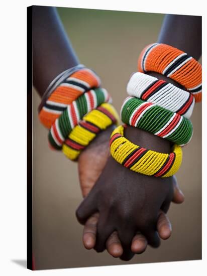 Kenya, Laikipia, Ol Malo; a Samburu Boy and Girl Hold Hands at a Dance in their Local Manyatta-John Warburton-lee-Stretched Canvas