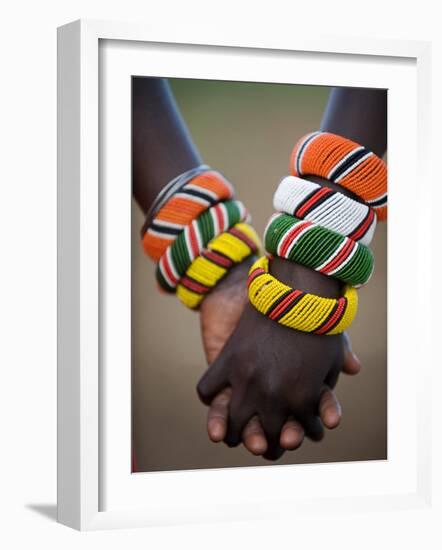 Kenya, Laikipia, Ol Malo; a Samburu Boy and Girl Hold Hands at a Dance in their Local Manyatta-John Warburton-lee-Framed Photographic Print