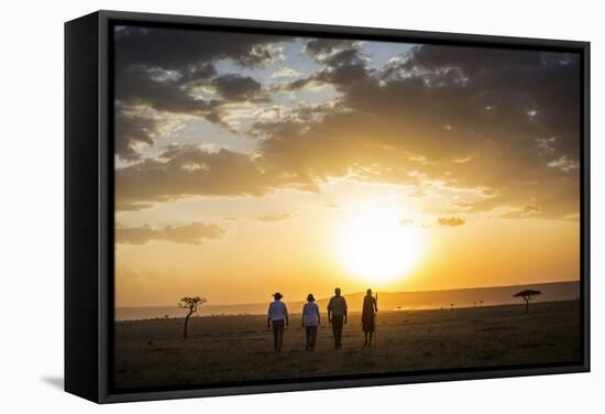 Kenya, Mara North Conservancy. a Couple on an Evening Walking Safari with their Guide and Maasai.-Niels Van Gijn-Framed Stretched Canvas