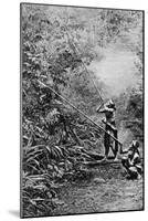 Kenyah Men Hunting for Monkeys with Blowpipes, Borneo, 1922-Charles Hose-Mounted Giclee Print