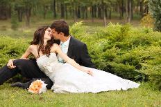 Wedding, Beautiful Young Bride Lying Together with Groom in Love on Green Grass Kissing-khorzhevska-Framed Photographic Print