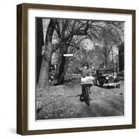 Kid Football Player Delivering Newspapers-Francis Miller-Framed Photographic Print