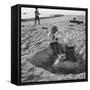 Kid Playing in Sand-Martha Holmes-Framed Stretched Canvas