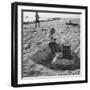 Kid Playing in Sand-Martha Holmes-Framed Photographic Print