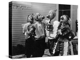 Kids Biting Apples on Strings at Halloween-null-Stretched Canvas