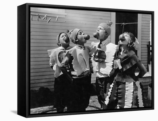 Kids Biting Apples on Strings at Halloween-null-Framed Stretched Canvas