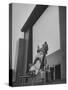 Kids Enjoying Slide in Mini Playground in Front of Rancho Drive-Allan Grant-Stretched Canvas