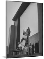 Kids Enjoying Slide in Mini Playground in Front of Rancho Drive-Allan Grant-Mounted Photographic Print