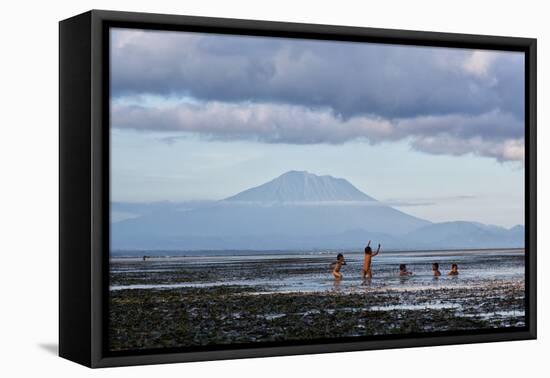 Kids Playing in the Water on the Coast of Bali-Alex Saberi-Framed Stretched Canvas