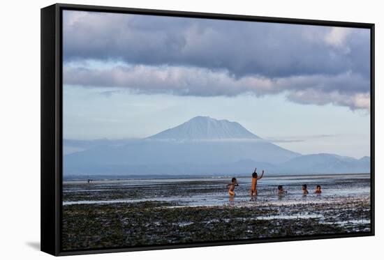 Kids Playing in the Water on the Coast of Bali-Alex Saberi-Framed Stretched Canvas