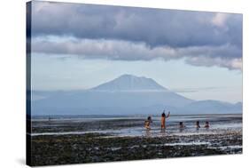 Kids Playing in the Water on the Coast of Bali-Alex Saberi-Stretched Canvas