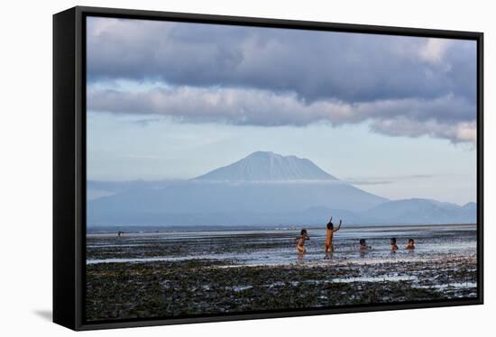 Kids Playing in the Water on the Coast of Bali-Alex Saberi-Framed Stretched Canvas