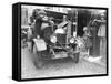Kids Refuelling a Car-null-Framed Stretched Canvas