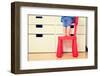 Kids Safety Concept- Little Girl Climbing on Baby Chair-NadyaEugene-Framed Photographic Print