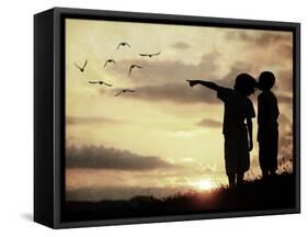 Kids Silhouette Looking at Birds on the Sky in Air-zurijeta-Framed Stretched Canvas