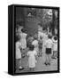 Kids Watching Outdoor Puppet Show-Dmitri Kessel-Framed Stretched Canvas