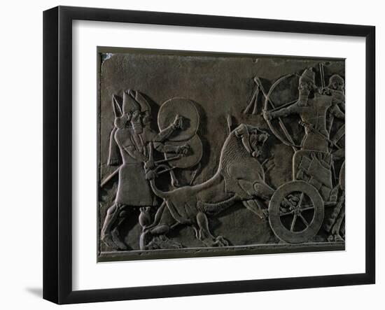 King Ashurnazirpal Hunting Lions, a Lion Leaping at the King's Chariot-null-Framed Giclee Print