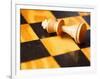 King chess piece lying on chessboard-null-Framed Photographic Print