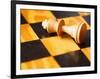 King chess piece lying on chessboard-null-Framed Photographic Print