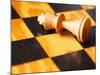 King chess piece lying on chessboard-null-Mounted Photographic Print
