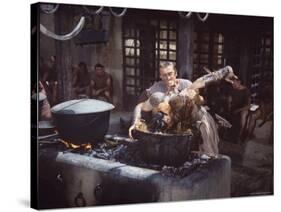 Kirk Douglas Dunking Enemy's Head in Giant Cook Pot in Scene From Stanley Kubrick's "Spartacus"-J^ R^ Eyerman-Stretched Canvas