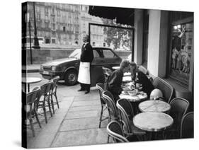 Kissing at Sidewalk Cafe, Paris-Peter Turnley-Stretched Canvas