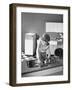 Kitchen Scene, Warwick, Warwickshire, 1966-Michael Walters-Framed Photographic Print