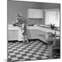 Kitchen Scene, Warwick, Warwickshire, 1966-Michael Walters-Mounted Photographic Print