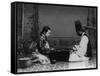 Korean Man and Woman Playing a Game Photograph - Korea-Lantern Press-Framed Stretched Canvas