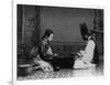 Korean Man and Woman Playing a Game Photograph - Korea-Lantern Press-Framed Art Print