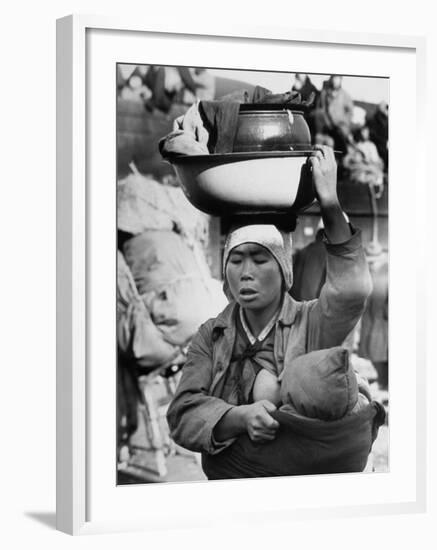 Korean Mother Nursing Her Baby, Carrying All Her Belongings in a Wash Basin, Retreating from Seoul-Carl Mydans-Framed Photographic Print