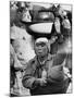 Korean Mother Nursing Her Baby, Carrying All Her Belongings in a Wash Basin, Retreating from Seoul-Carl Mydans-Mounted Photographic Print