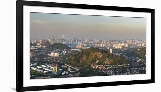 Kuala Lumpur skyline seen at sunrise from Bukit Tabur Mountain, Malaysia, Southeast Asia, Asia-Matthew Williams-Ellis-Framed Photographic Print
