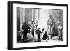 Kurdish Barber, Outside Kazimain Mosque, Iraq, 1917-1919-null-Framed Giclee Print