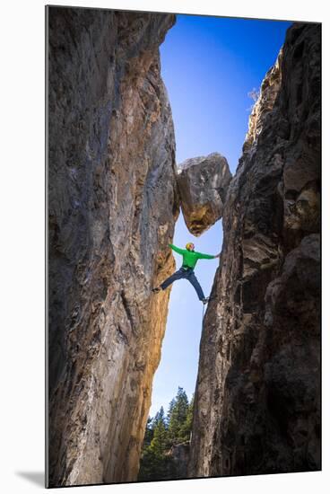 Kyle Vassilopoulos Having Fun Climbing Below A Large Chock Stone Slot Canyon At Natural Bridge SP-Ben Herndon-Mounted Photographic Print