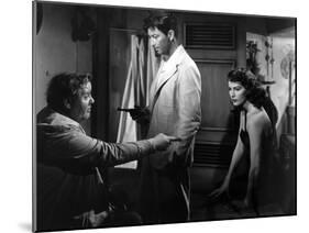 L'ile au complot THE BRIBE by RobertLeonard with Charles Laughton, Ava Gardner and Robert Taylor, 1-null-Mounted Photo
