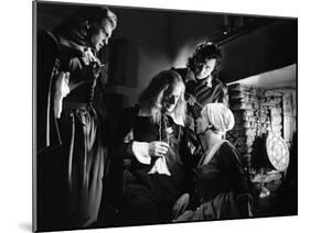 La Belle and la Bete by JeanCocteau with Jean Marais, Marcel Andre, Michel Auclair and Josette Day,-null-Mounted Photo