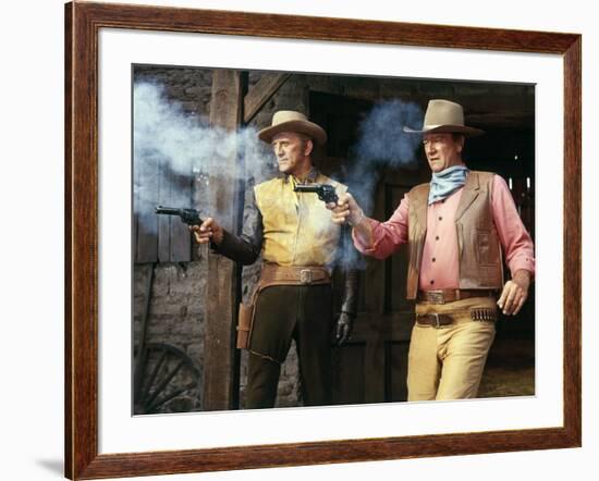 La caravane by feu THE WAR WAGON by Burt Kennedy with Kirk Douglas and John Wayne, 1967 (photo)-null-Framed Photo