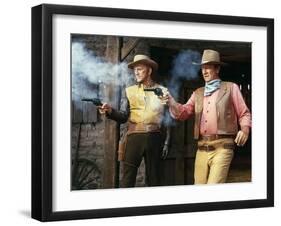 La caravane by feu THE WAR WAGON by Burt Kennedy with Kirk Douglas and John Wayne, 1967 (photo)-null-Framed Photo