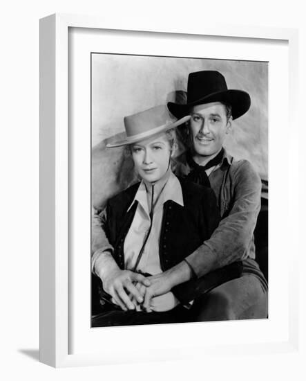 La Caravane heroique (Virginia City) by MichaelCurtiz with Miriam Hopkins and Errol Flynn, 1940 (b/-null-Framed Photo